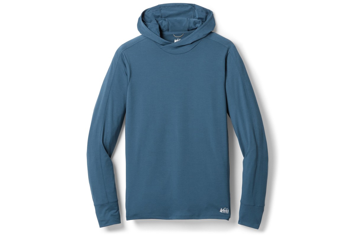 A lightweight light blue REI Co-op Sahara Shade Hoodie.