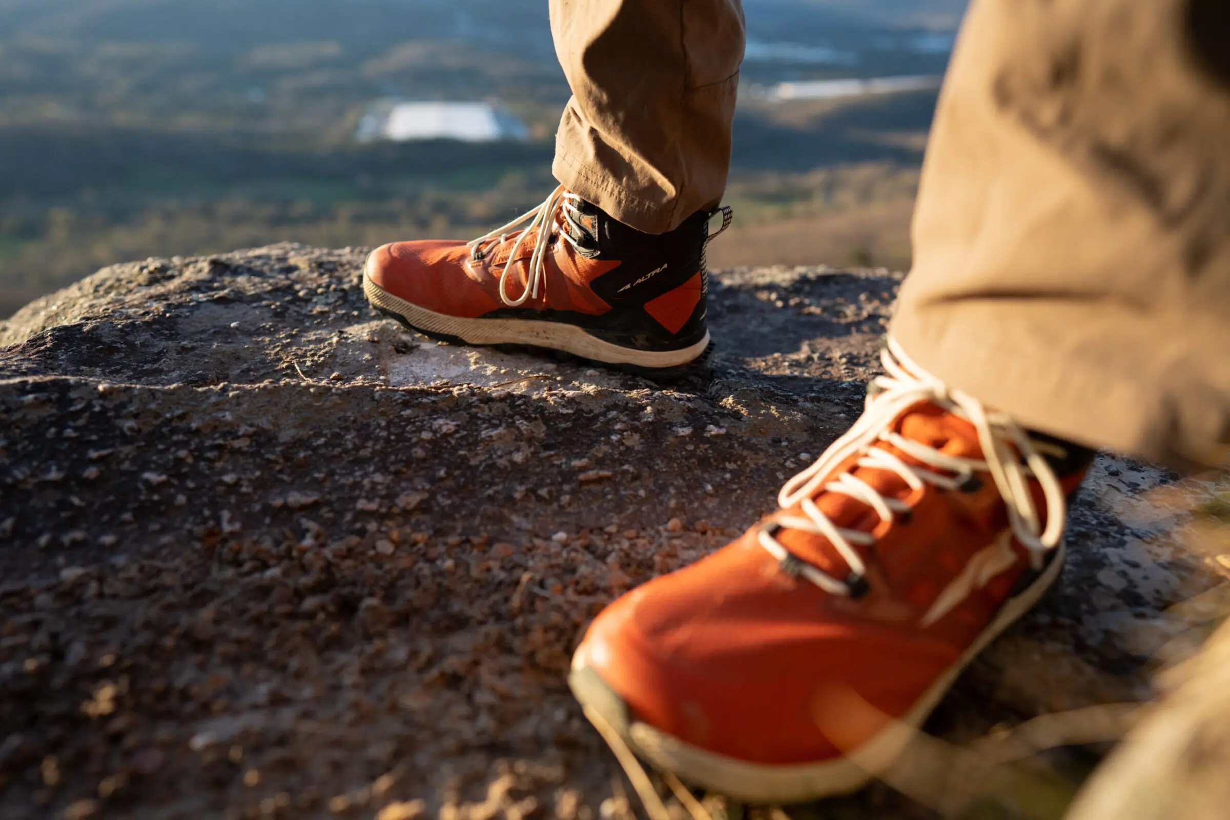 User wearing Altra Lone Peak All-Weather Mid 2 boots showing the wide, foot-shaped toe box.