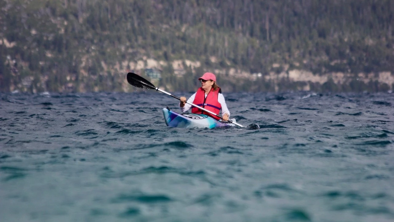 Close-up of a drop-down tracking skeg on a Dagger Stratos kayak.