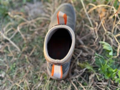 SITKA Rover GTX boots submerged in shallow water to demonstrate the GORE-TEX waterproof barrier.