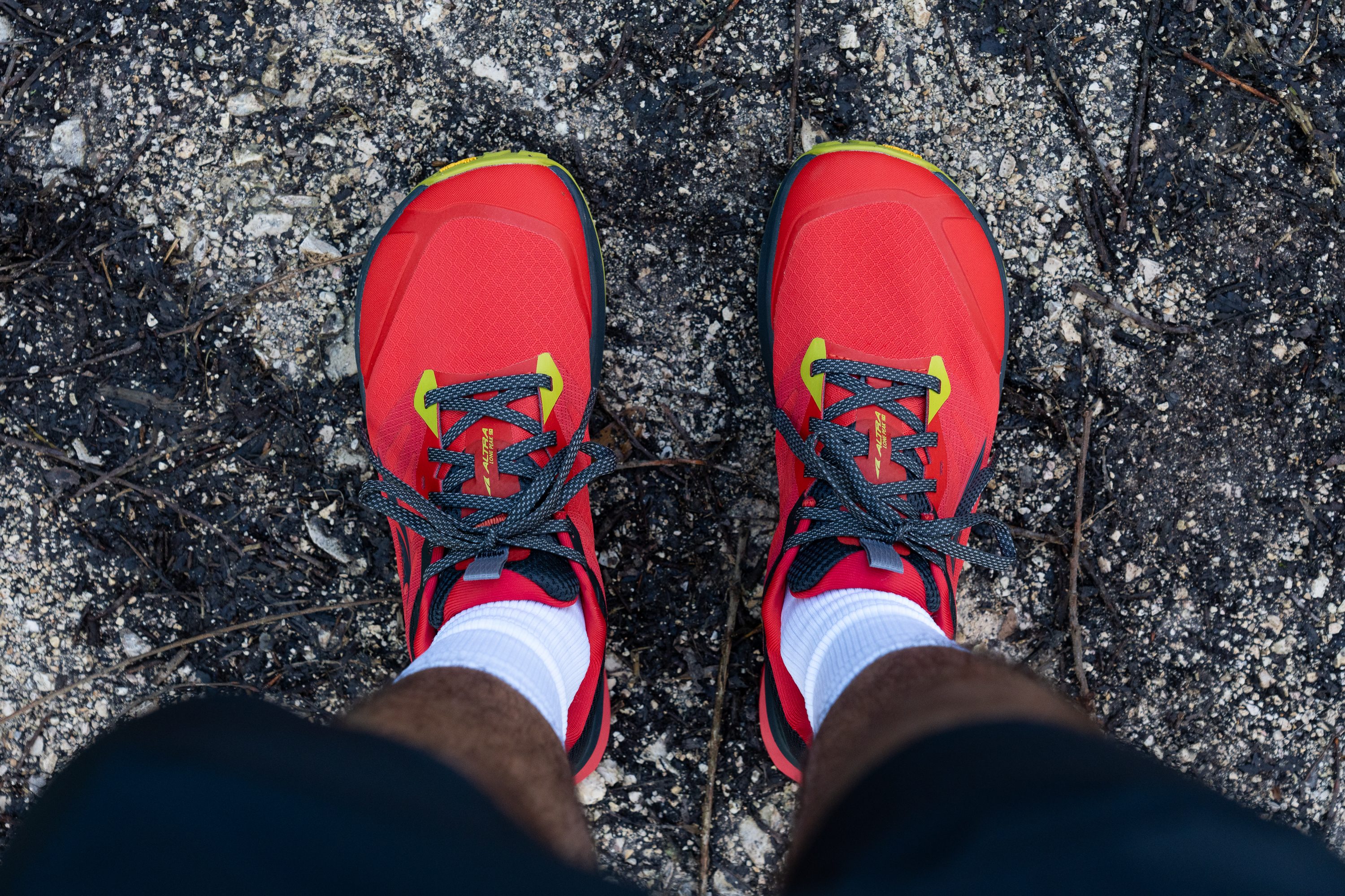 A POV shot looking down at the wide toe box of the Altra Lone Peak 9+ GTX