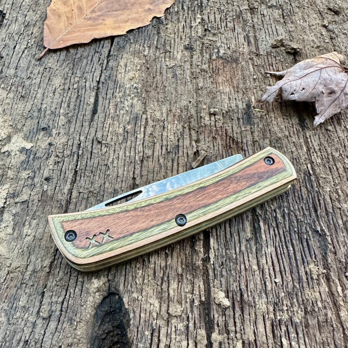 Case Crossroads XR Sod Buster Jr pocket knife featuring a dark Dymalux wood handle.