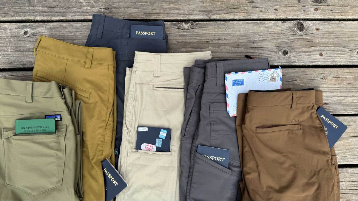 Close-up of different pocket designs on various technical travel pants.