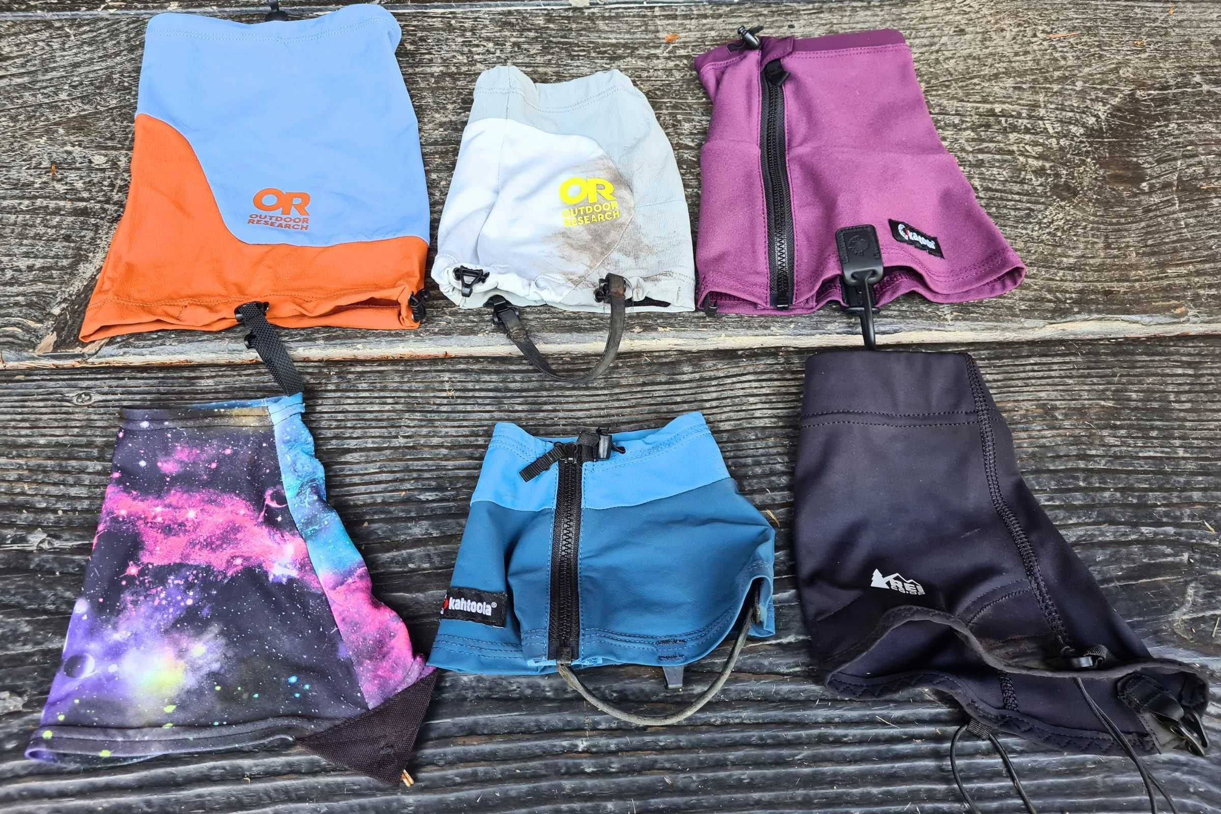 A side-by-side display of six different gaiters, showing three mid-height models on top and three low-cut models on the bottom.