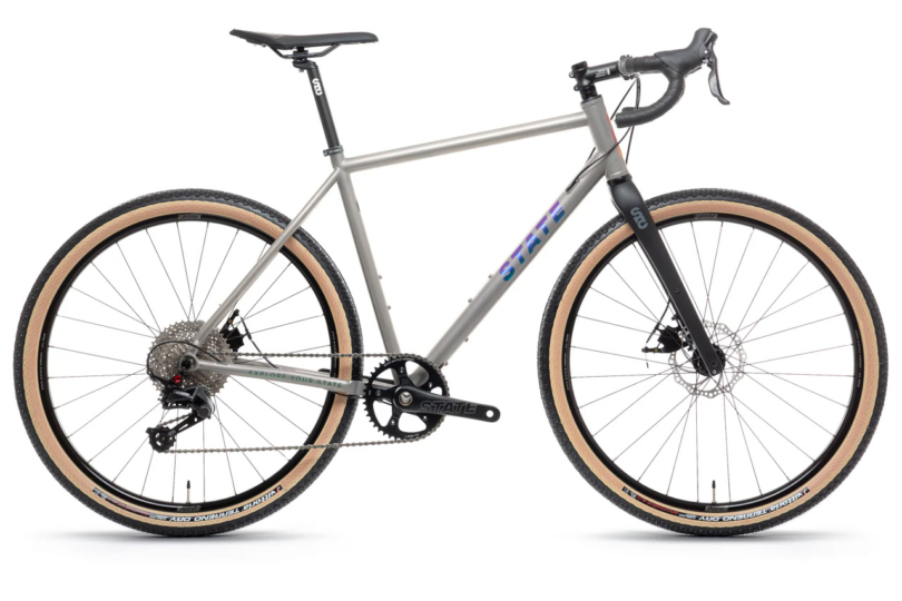 A completed titanium gravel bike equipped with 1x drivetrain and wide tires.