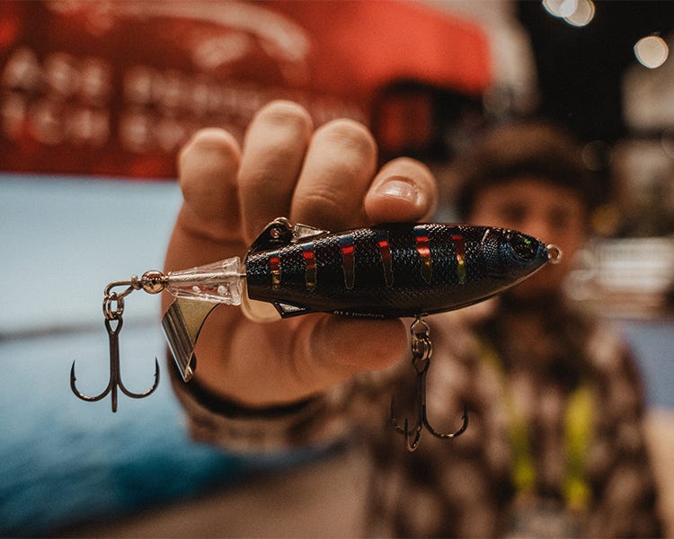 Rapala Claptail topwater lure with a segmented tail design.