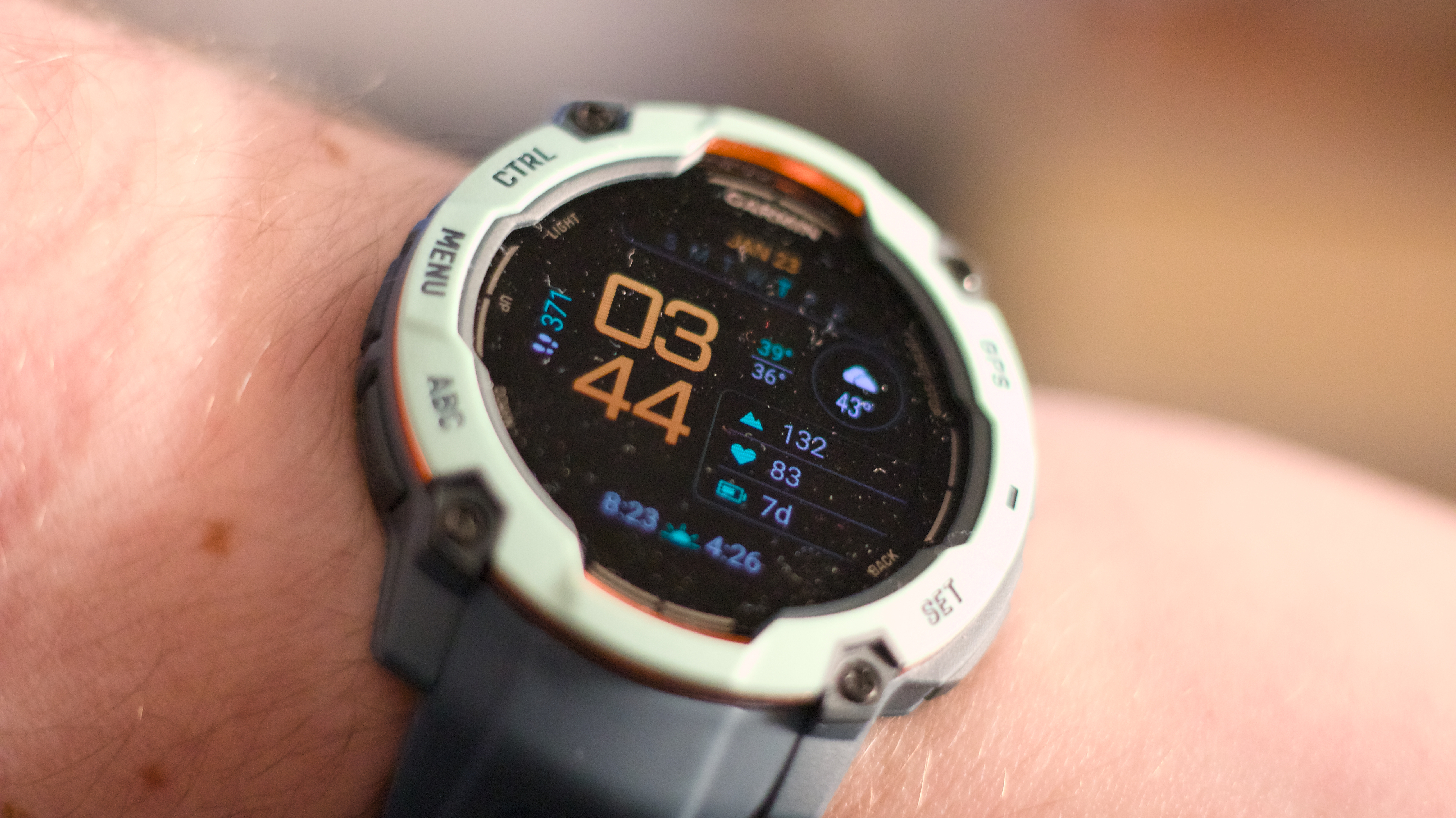 Rugged Garmin Instinct 3 outdoor watch with a high-contrast monochrome display.