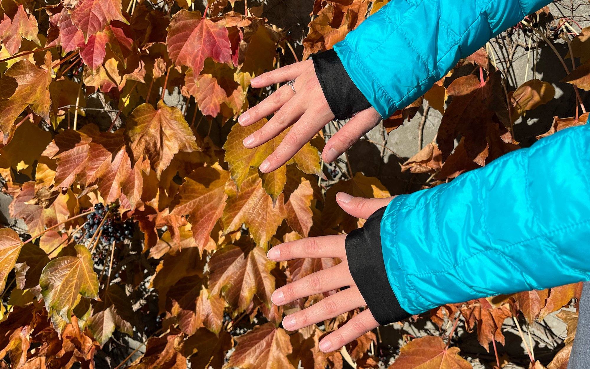 Close-up of thumb holes on a Fieldsheer heated jacket sleeve for better heat sealing and wind protection.