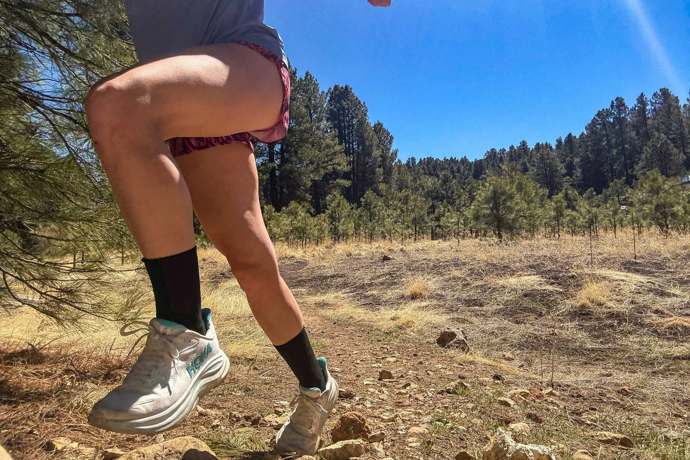Side profile of the Hoka Clifton 10 midsole highlighting the rocker shape.