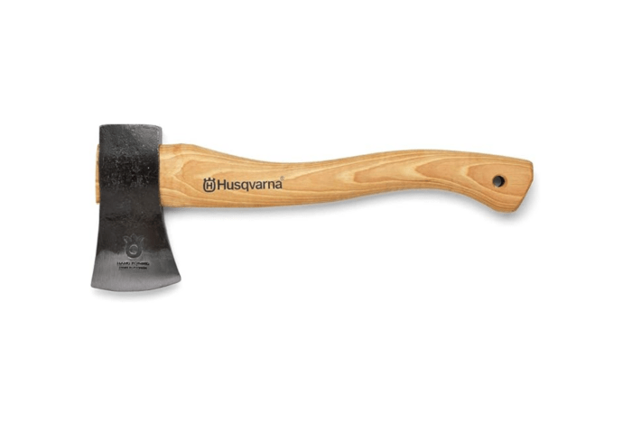 A Husqvarna Swedish Style Hatchet with a hickory handle resting on a wooden surface.