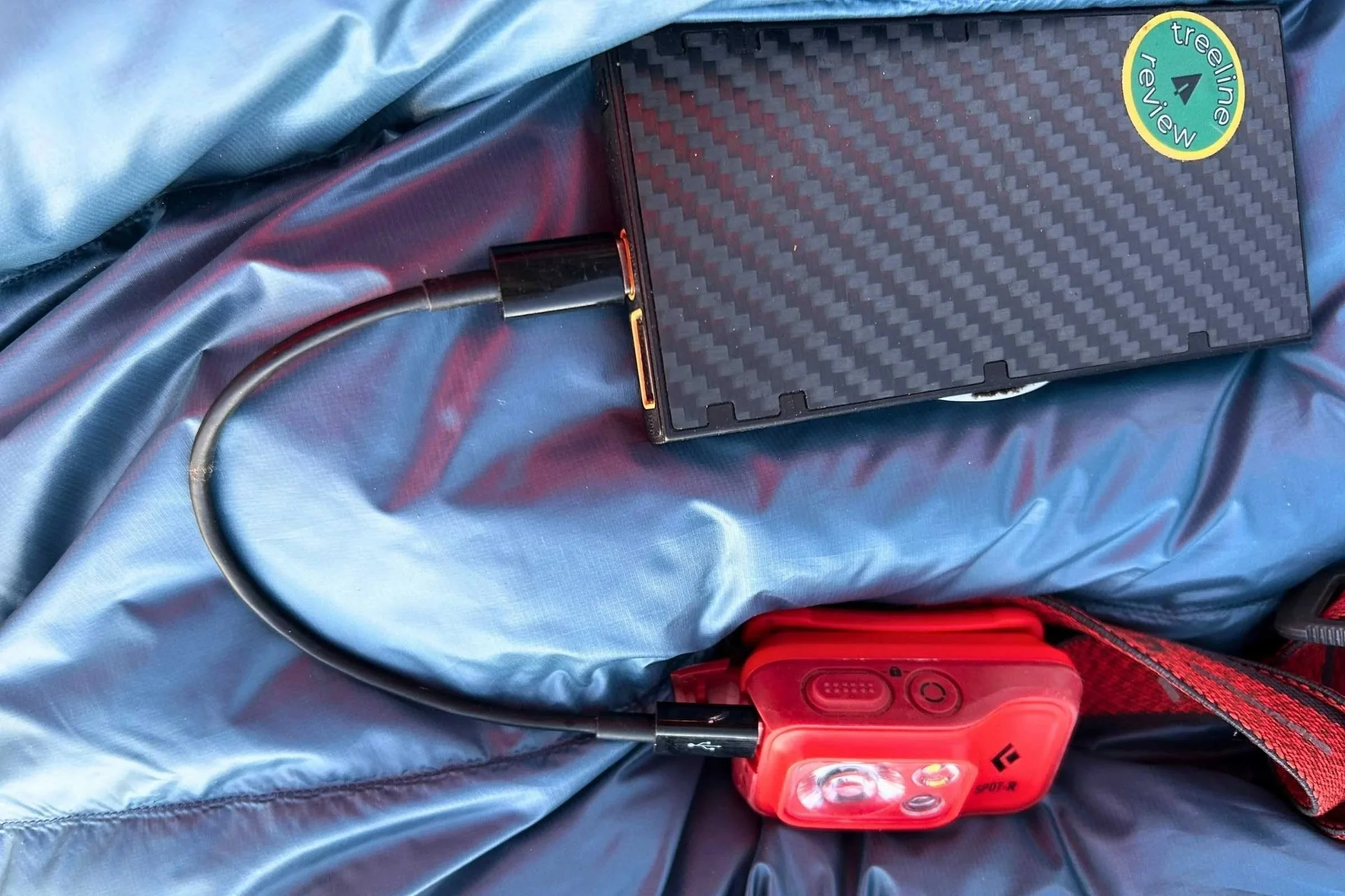 Comparing the size of a 10,000 mAh power bank versus a larger 20,000 mAh unit.