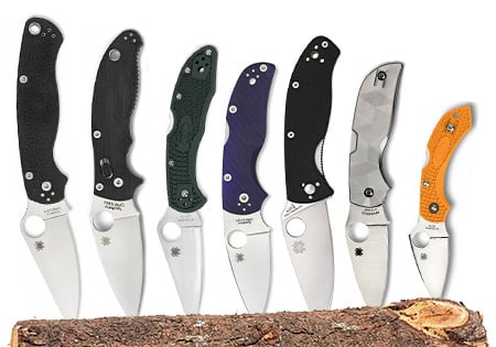 Selection of different Spyderco folding knife models featuring trademark thumb holes.
