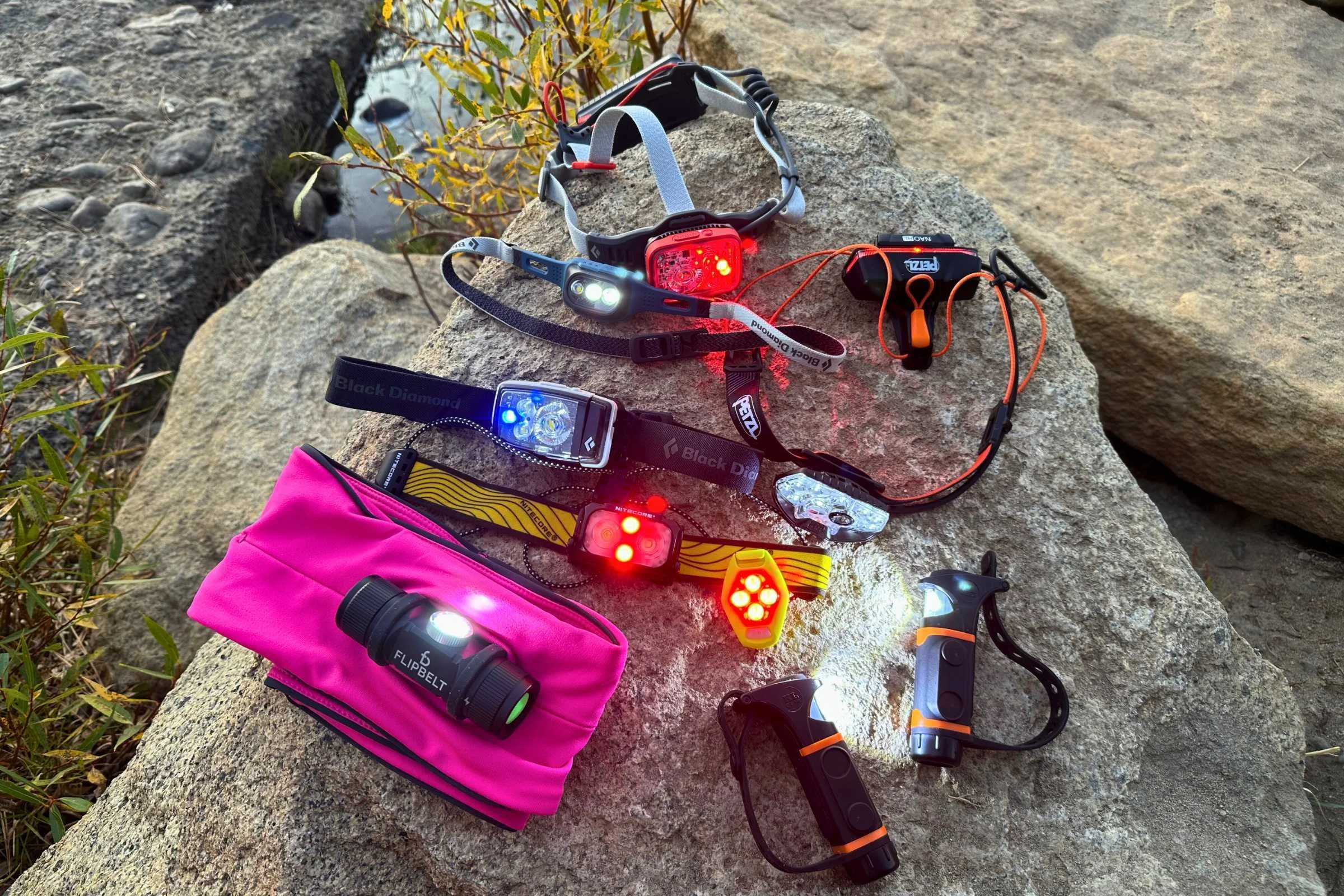 An array of various running lights showing different battery enclosures and strap materials.
