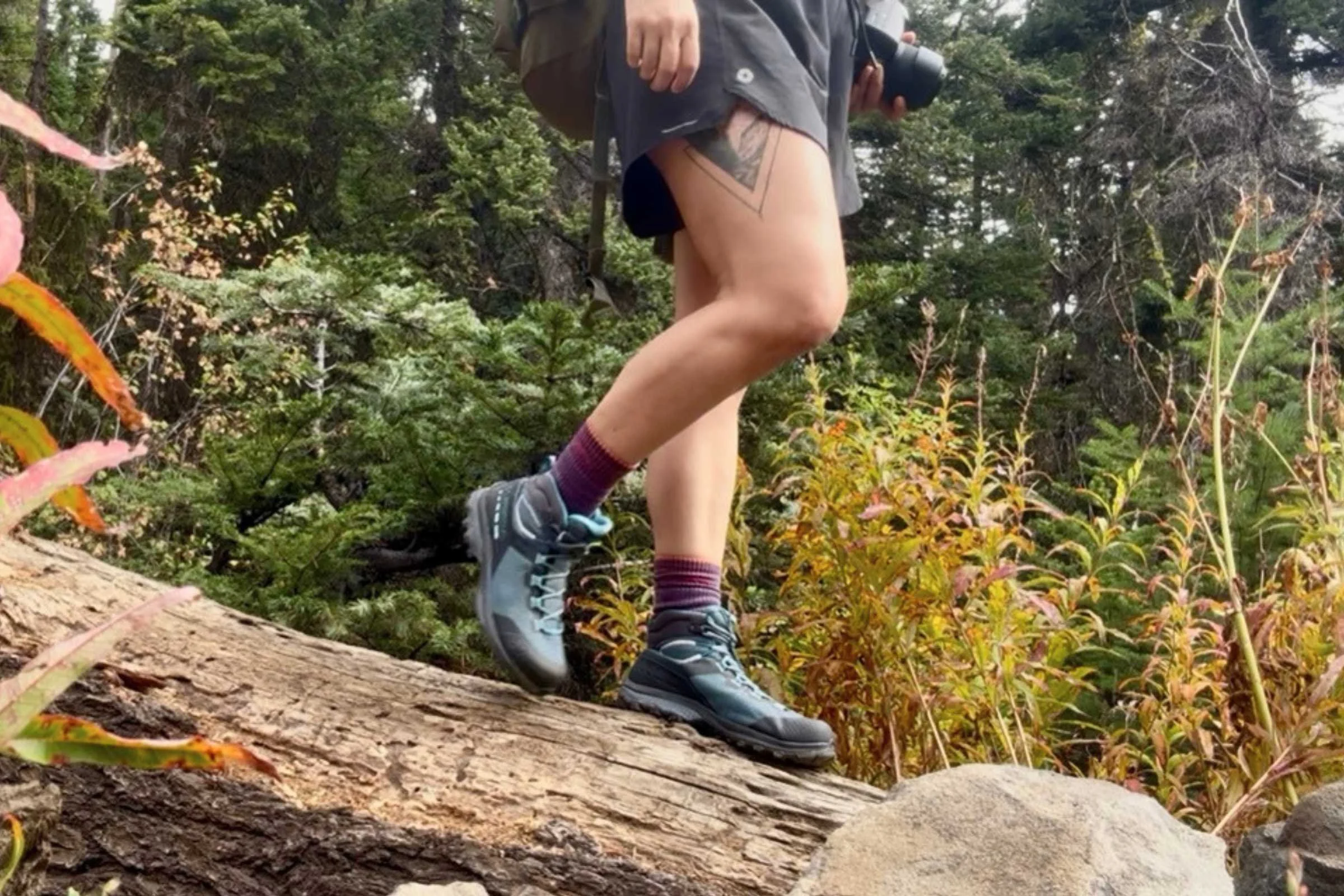 A side view of the La Sportiva TX Hike Mid GTX waterproof hiking boot showing its technical design and sole.
