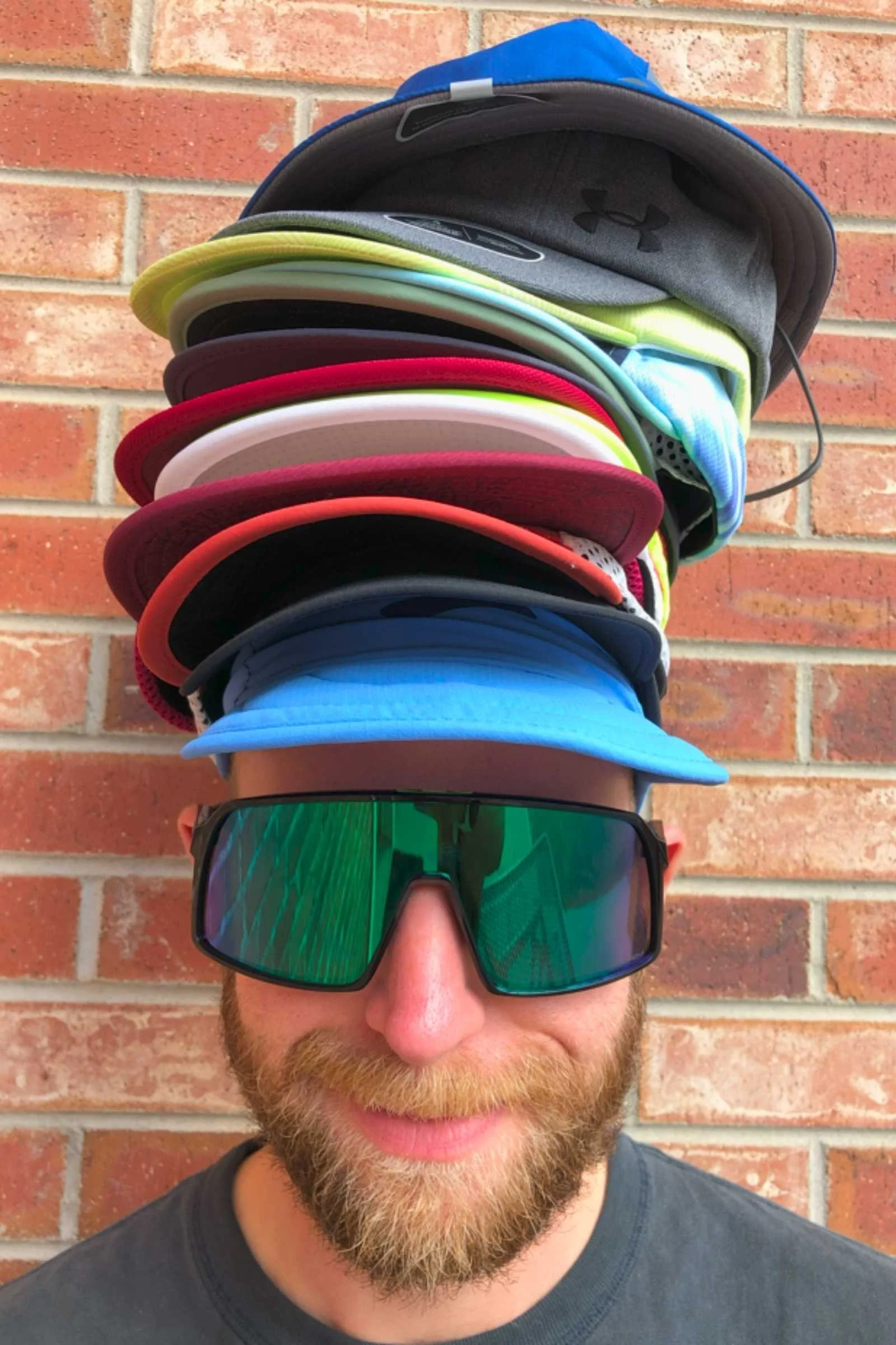 Rear view of a runner's head wearing a white performance cap during an outdoor run.