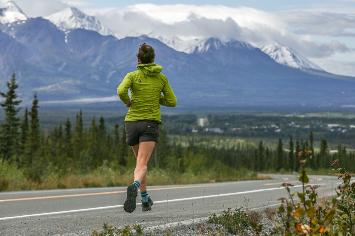 A female runner testing shoes in a mountain landscape in North Vancouver.