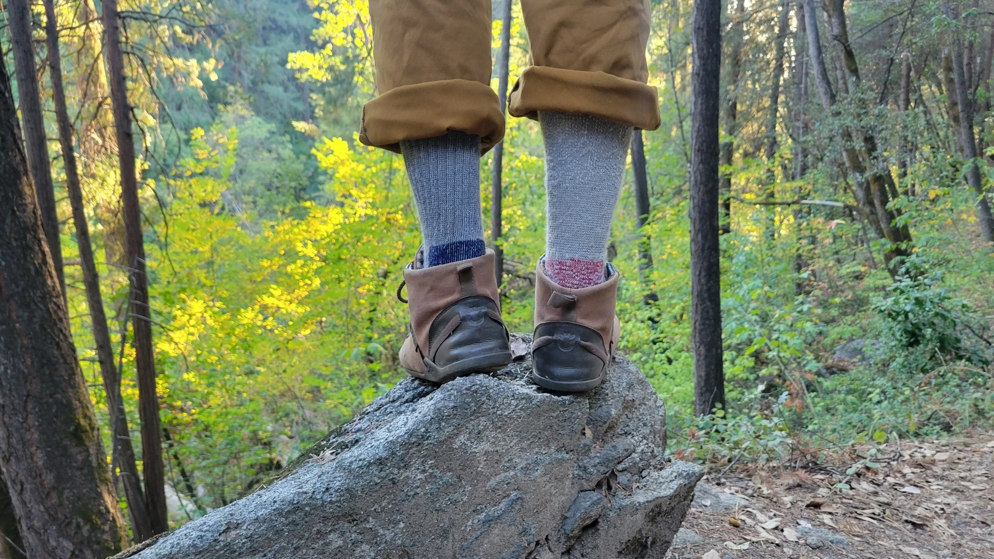 Two pairs of thick grey and blue heavyweight wool socks compared side-by-side.
