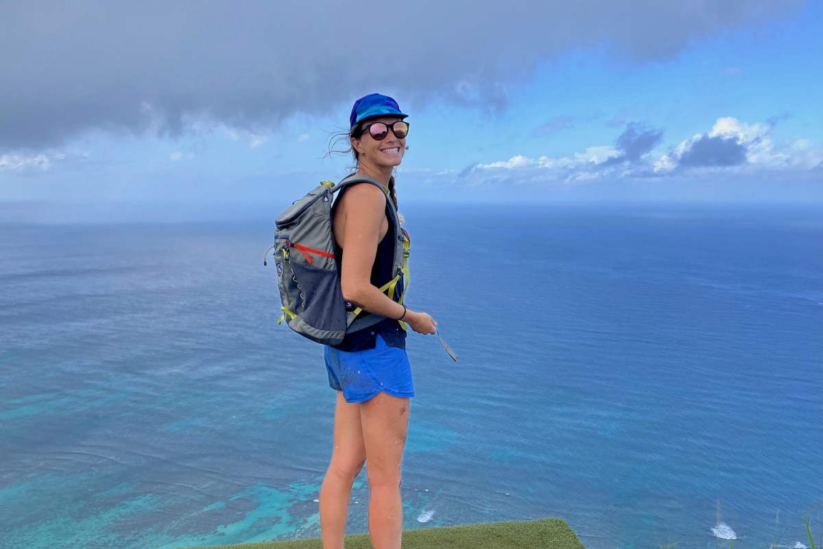 Tester wearing sunglasses during a hiking expedition in Hawaii.