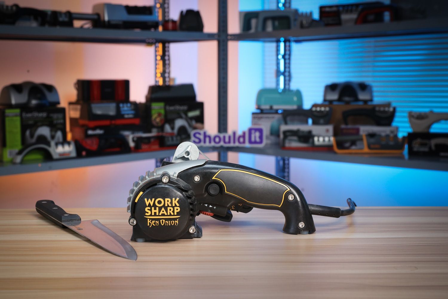 The Work Sharp Ken Onion electric belt sharpener highlighting its abrasive belt system.