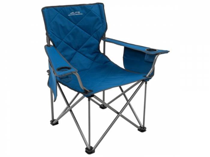 The ALPS Mountaineering King Kong Chair set up in a forest.