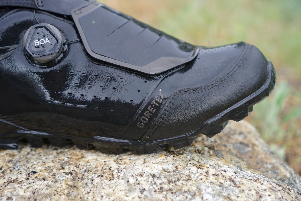 A Shimano MW7 waterproof mountain bike shoe with GORE-TEX lining and an ankle gaiter.