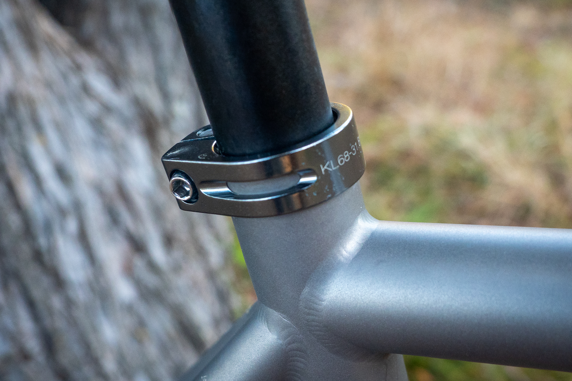 Close-up of clean welds on a titanium bike seatstay cluster.