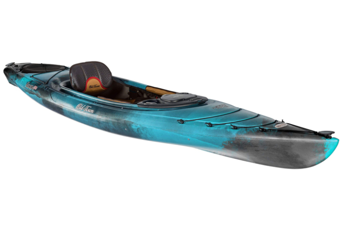 Side profile of an Old Town Loon 120 kayak on grass near water.