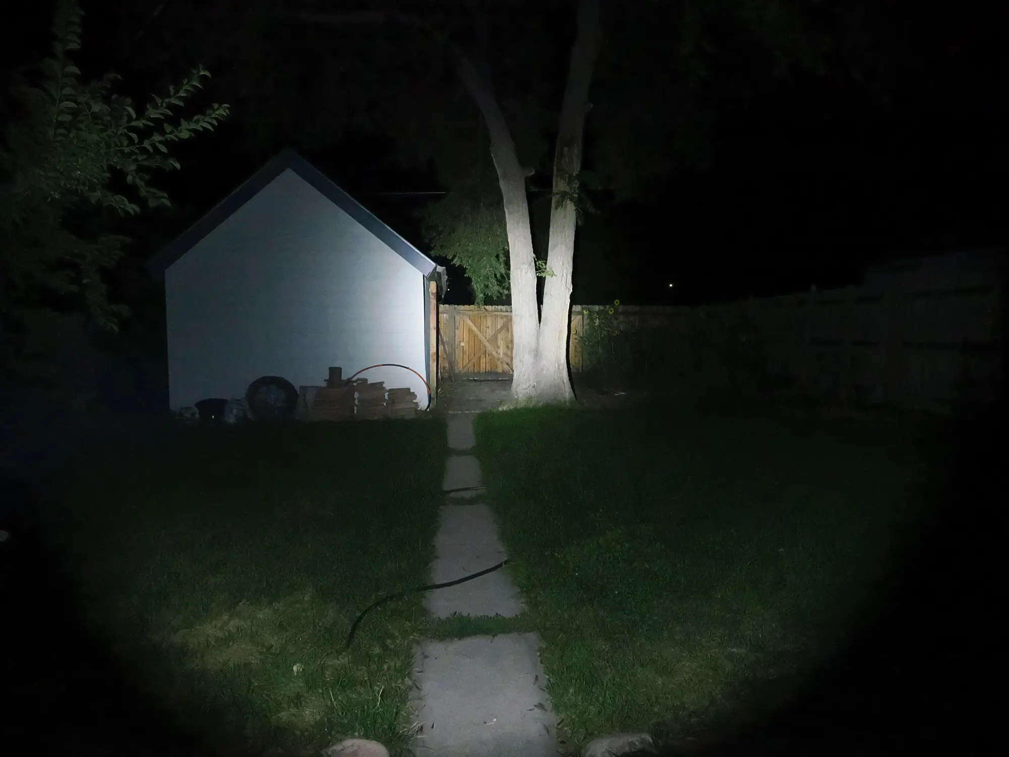 Beam shot of the Fenix PD36R Pro showing a strong center spotlight with effective peripheral spill.