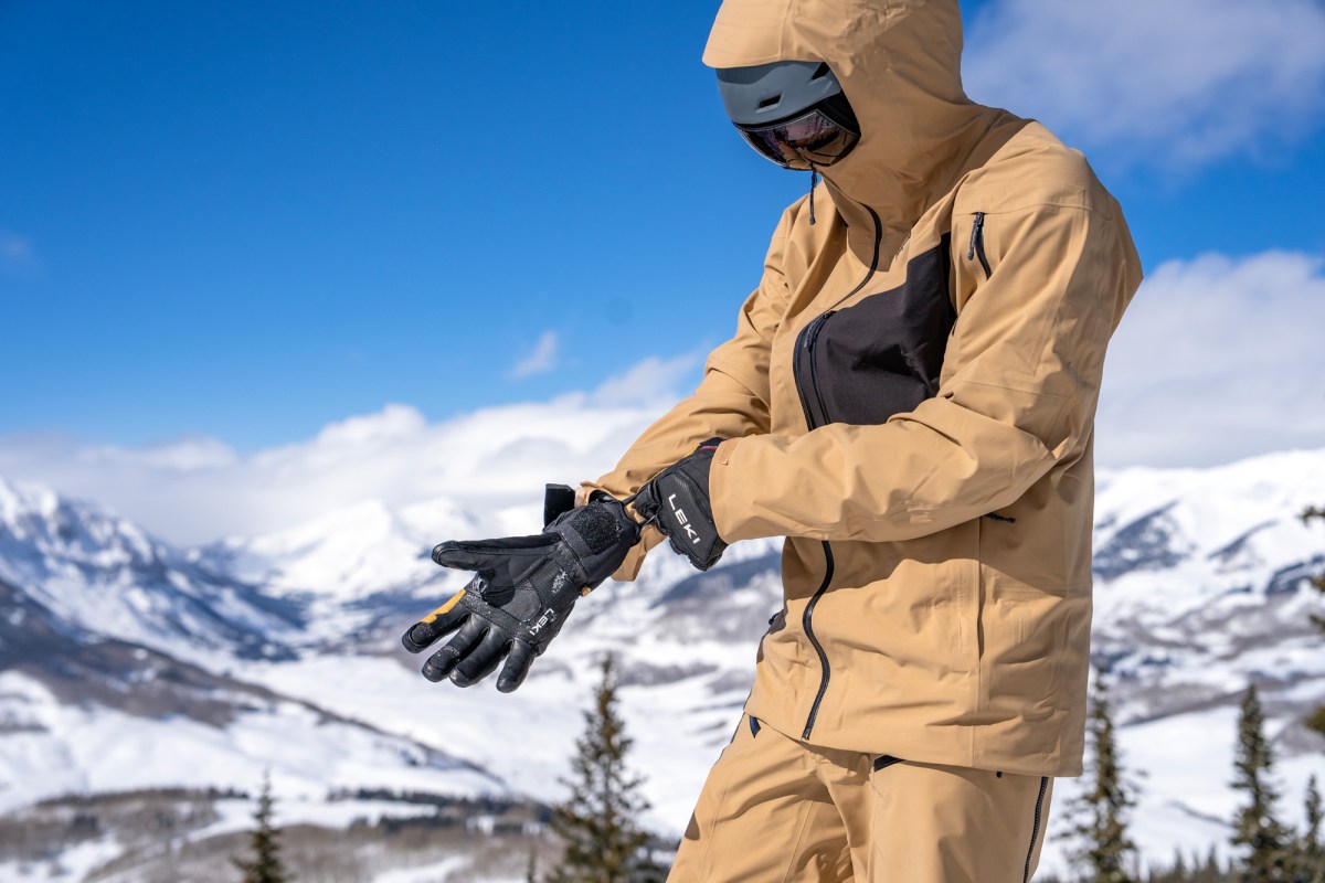 Close up of ski gloves caked in snow during extreme winter testing.
