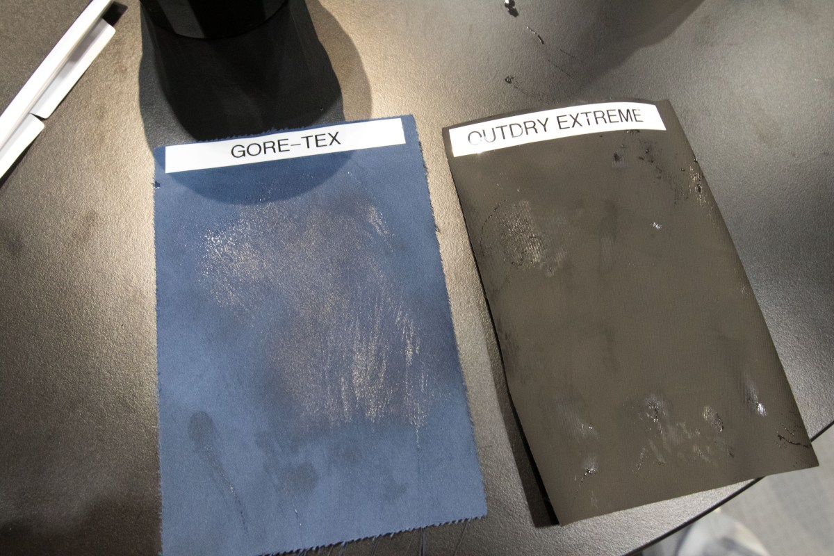 Side by side comparison of water absorption on two different waterproof fabrics.
