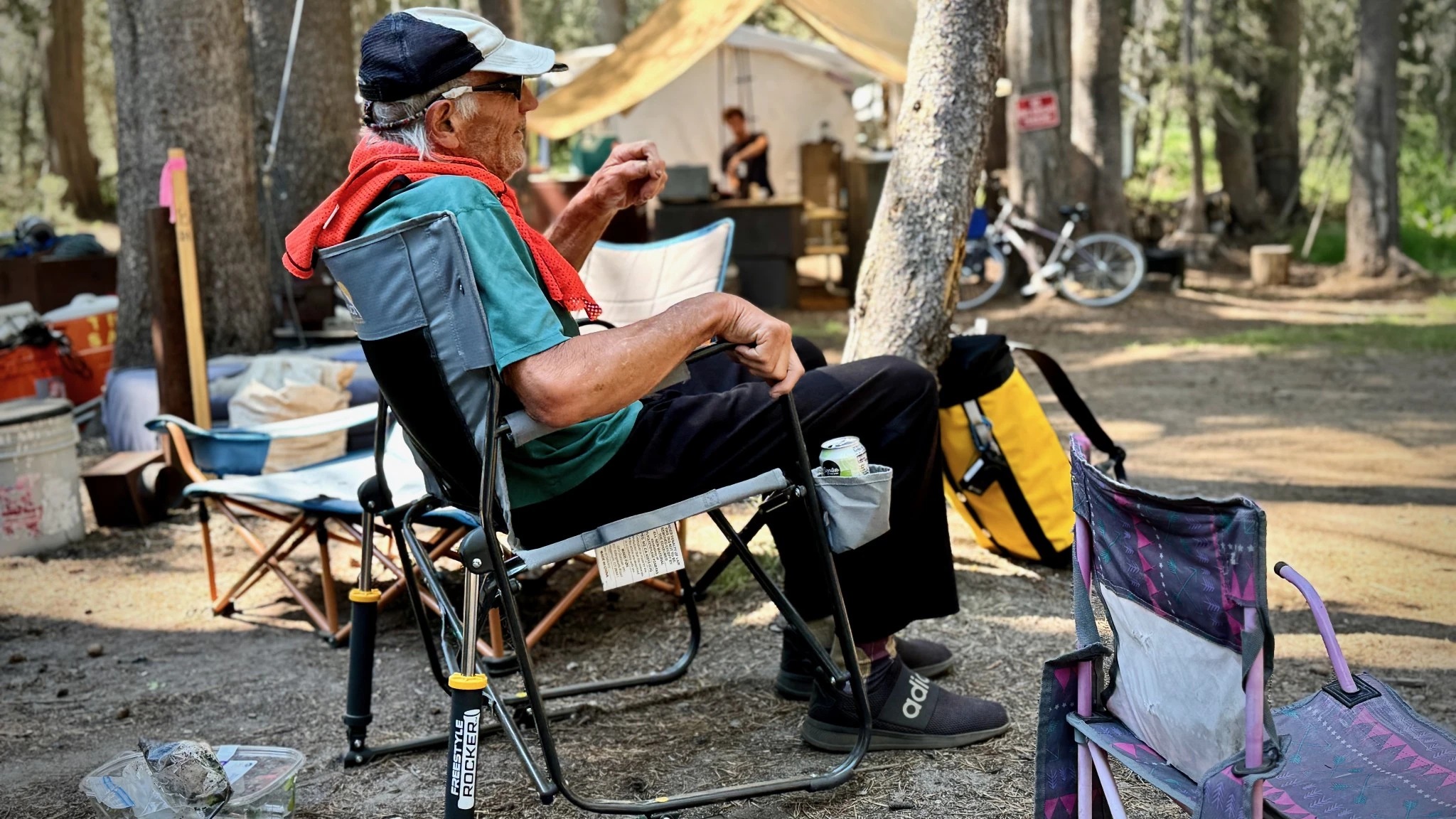 A variety of different camping chairs lined up for comparison.